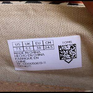 Brand New Never Worn animal print Toms slip on shoe